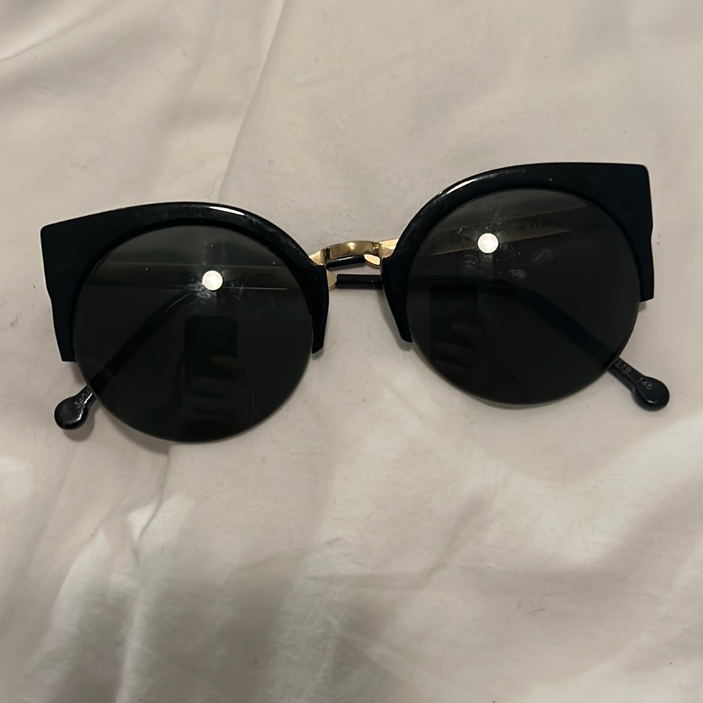 RetroSuperfuture black and gold Cateye sunglasses